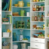 Adjustable shelves hold everything you need to prepare meals or entertain with ease, from books and bowls to canned goods, seasonings and even countertop appliances. Corner shelves provide extra depth for big items, and pull-out baskets keep produce within sight and easy to reach. The wall-hung design is open underneath for easy cleaning.